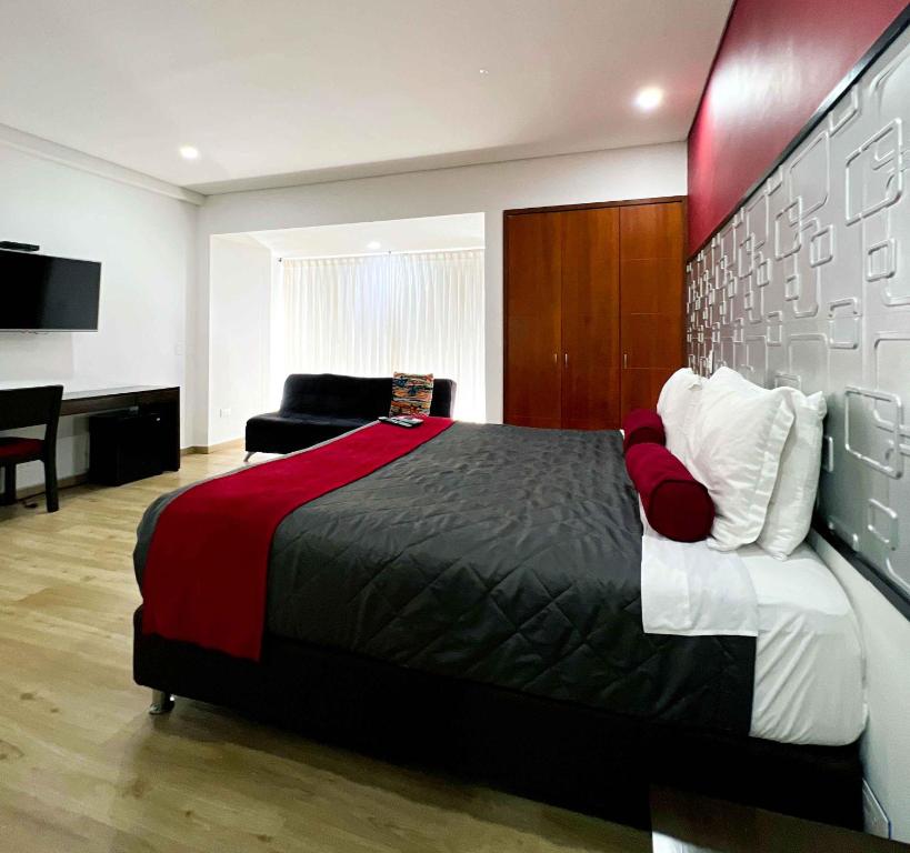 Postel nebo postele na pokoji v ubytování Hotel Florencia Plaza
