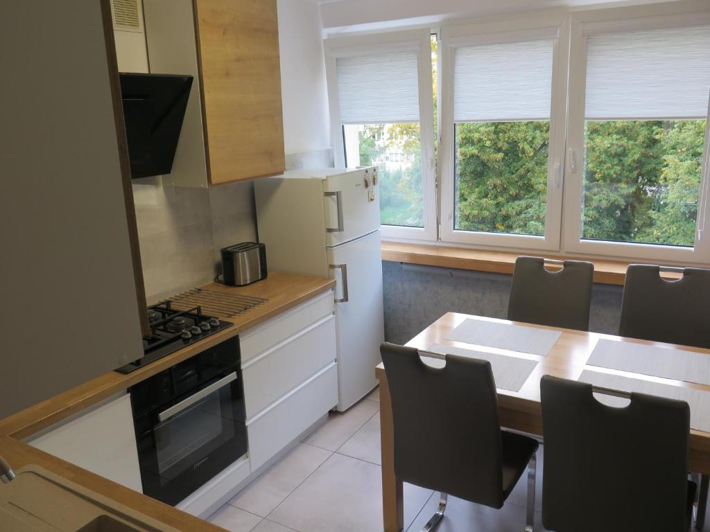 Kuchyňa alebo kuchynka v ubytovaní Apartament Nadmorski Piastowska 66