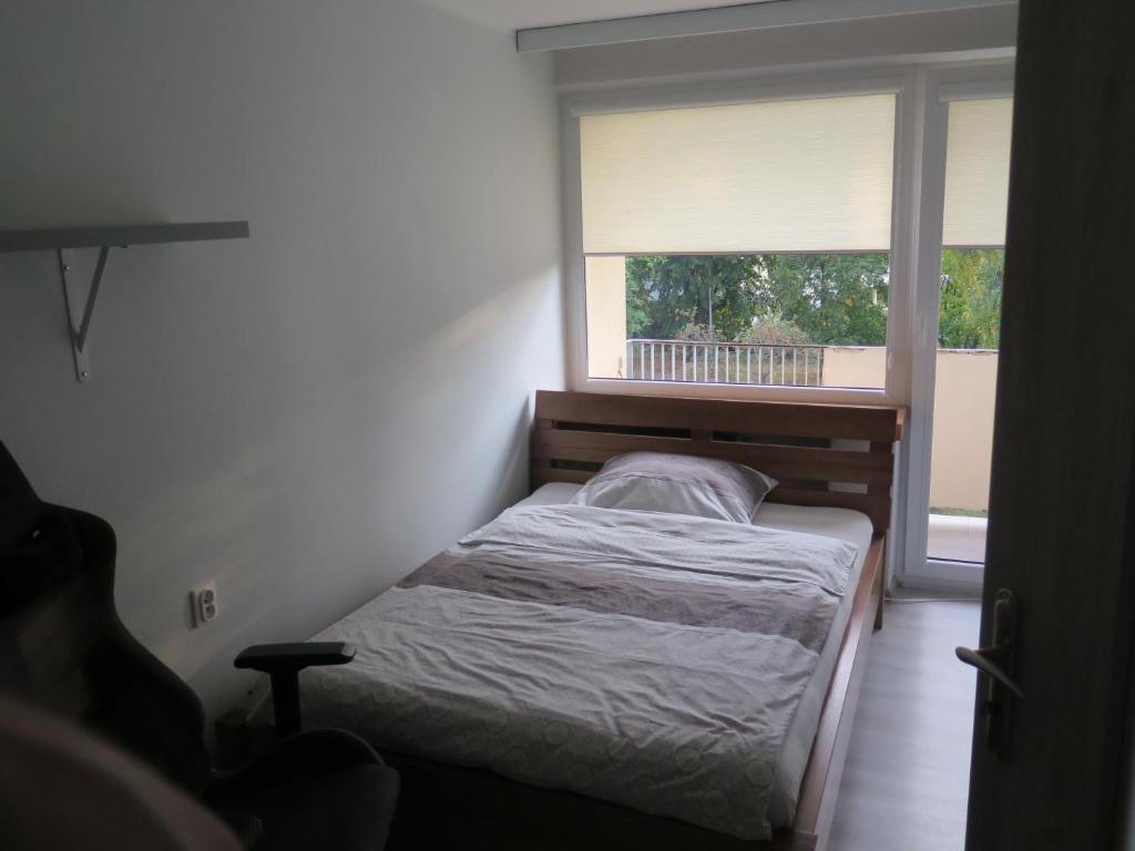 Posteľ alebo postele v izbe v ubytovaní Apartament Nadmorski Piastowska 66