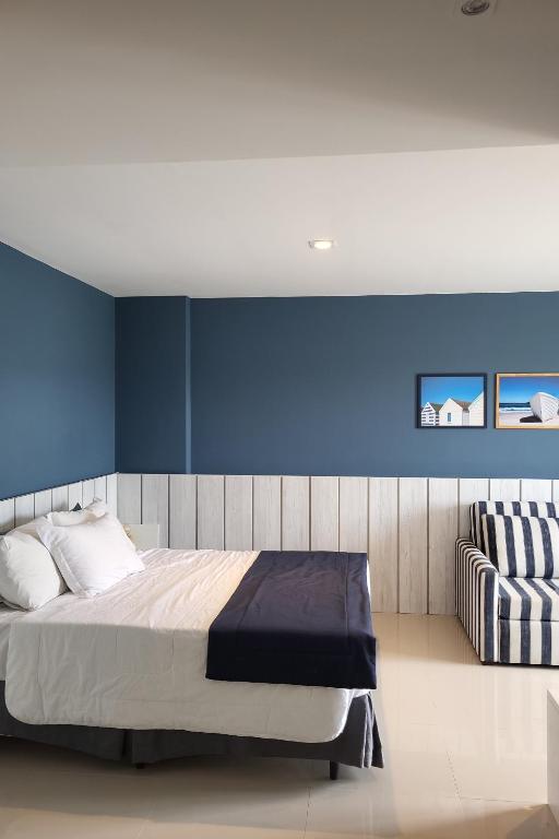 Una cama o camas en una habitación de Flat luxo no Hotel samba Cabo Frio
