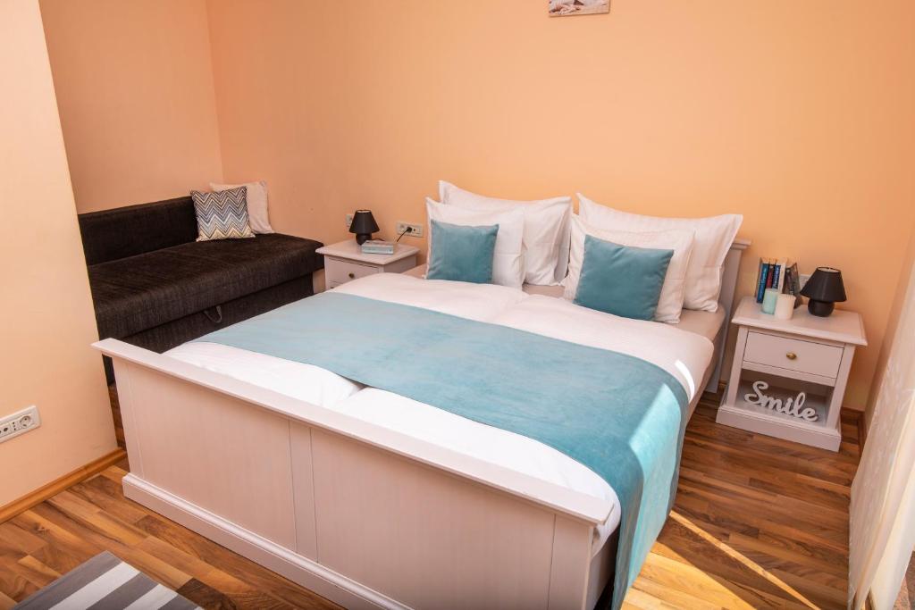 Posteľ alebo postele v izbe v ubytovaní Apartmani Dubrava