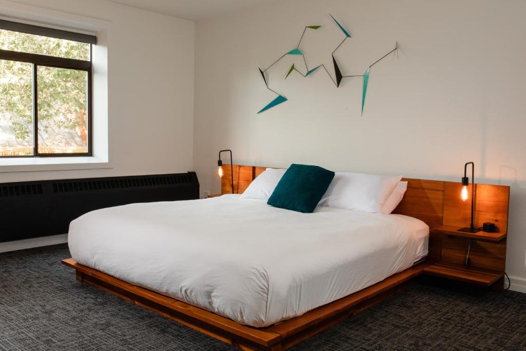 Postel nebo postele na pokoji v ubytování Hotel Leo