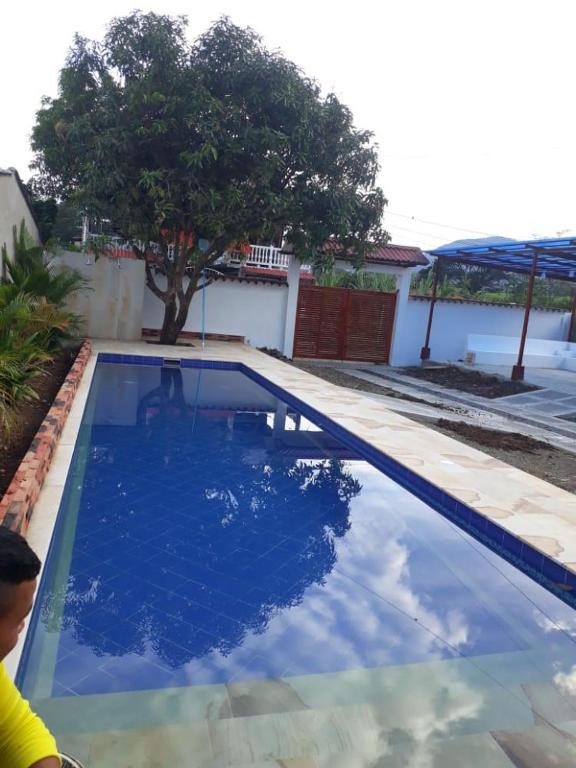 Bazén v ubytování Casa de descanso acacias meta nebo v jeho okolí