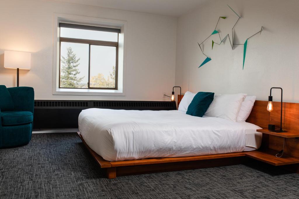 Postel nebo postele na pokoji v ubytování Hotel Leo