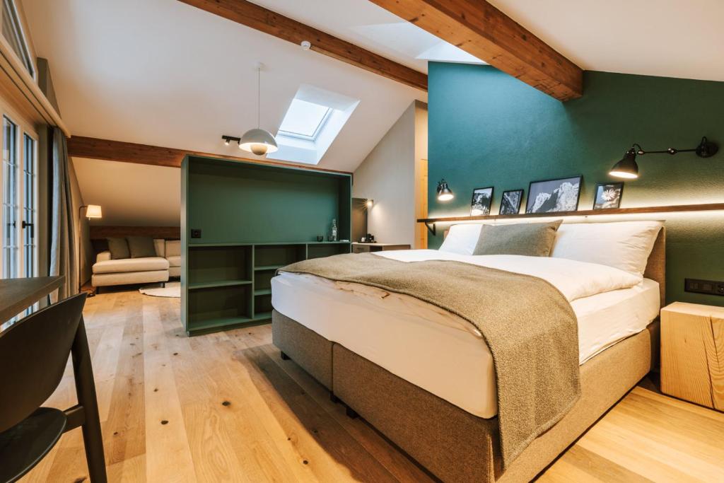 Postel nebo postele na pokoji v ubytování Hotel Fiescherblick