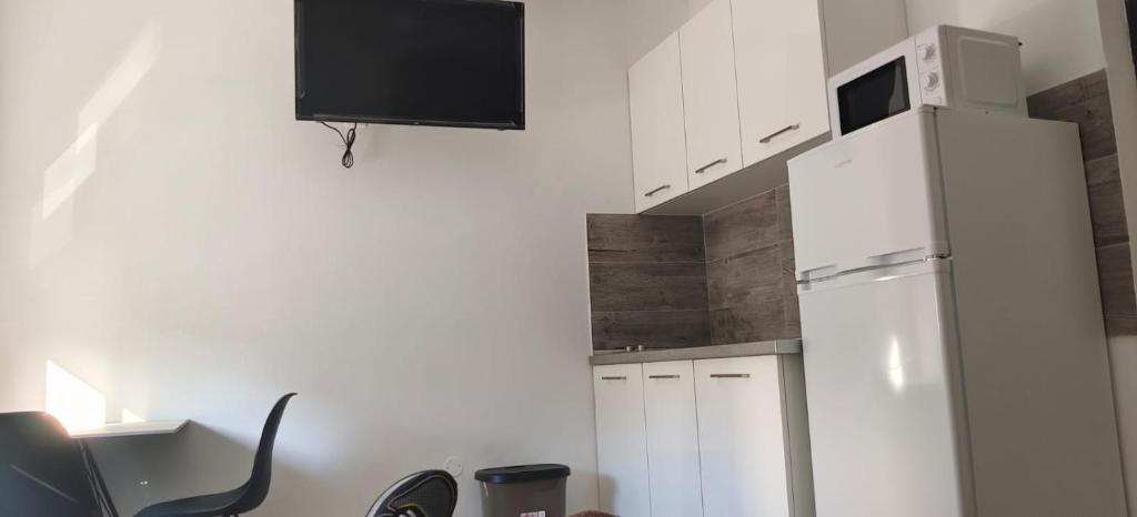 A kitchen or kitchenette at Lodge El Muelle Arinaga