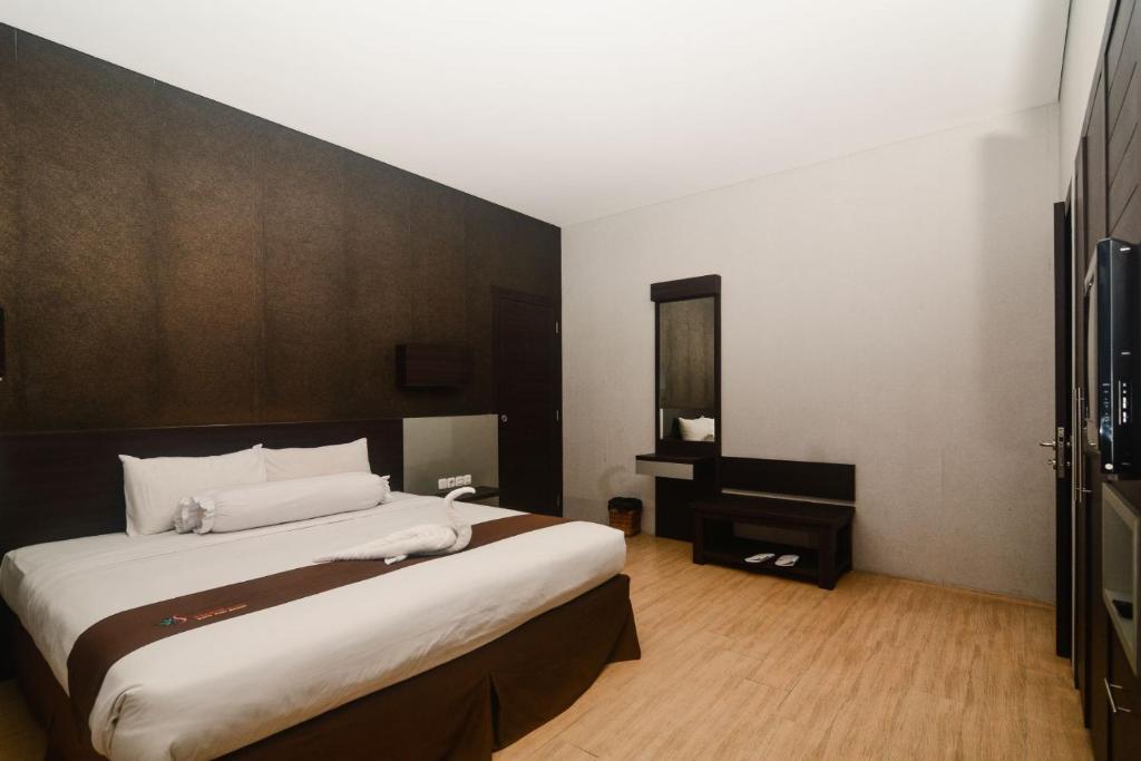 Postel nebo postele na pokoji v ubytování Batusuki Resort & Hotel