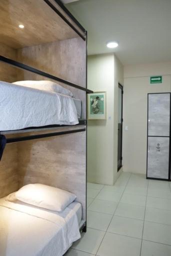 Letto o letti in una camera di HOSTAL XAO