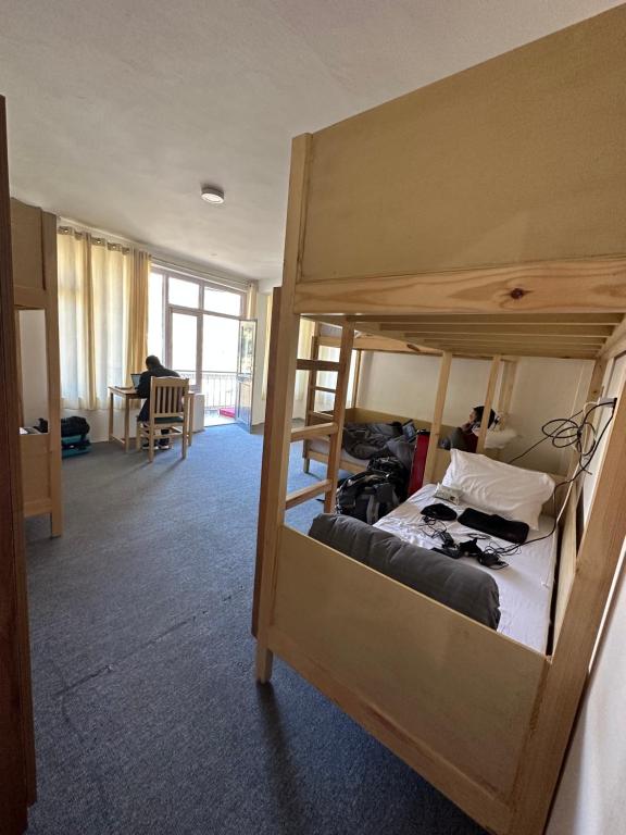 Postel nebo postele na pokoji v ubytování La Heim Hostels