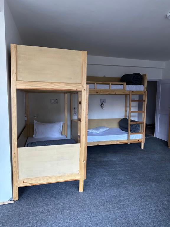 Postel nebo postele na pokoji v ubytování La Heim Hostels