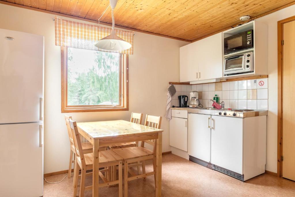Kuchyň nebo kuchyňský kout v ubytování First Camp Hökensås-Tidaholm