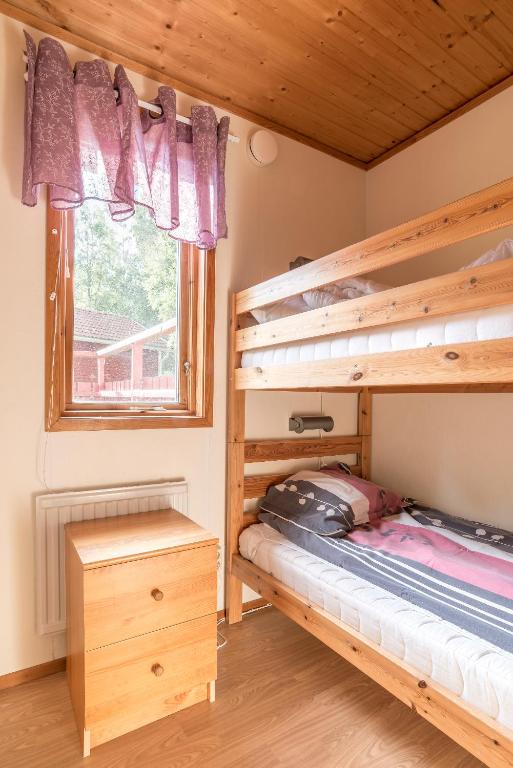 Postel nebo postele na pokoji v ubytování First Camp Hökensås-Tidaholm