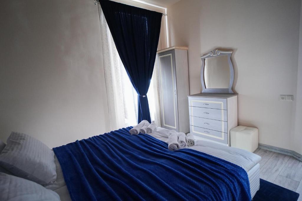Postel nebo postele na pokoji v ubytování VN Hotel Vanadzor