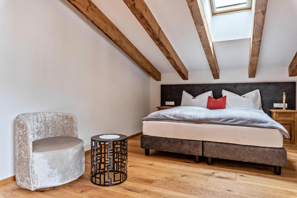 Postel nebo postele na pokoji v ubytování Alpin Chalet Samer