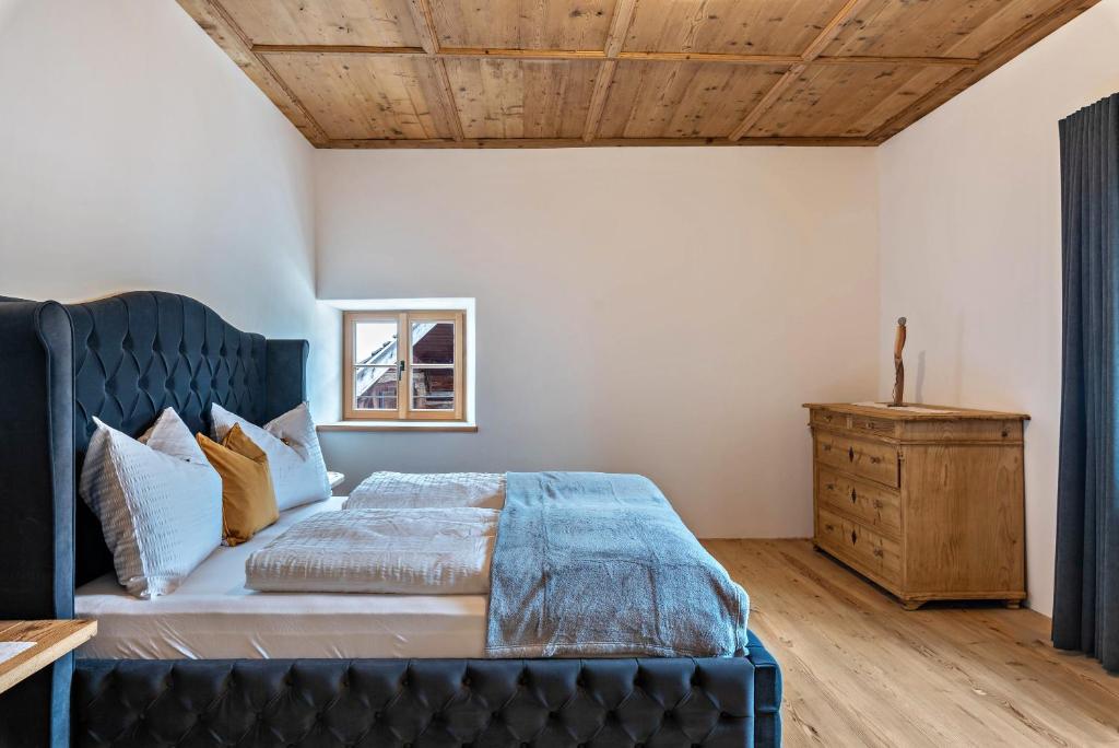 Postel nebo postele na pokoji v ubytování Alpin Chalet Samer