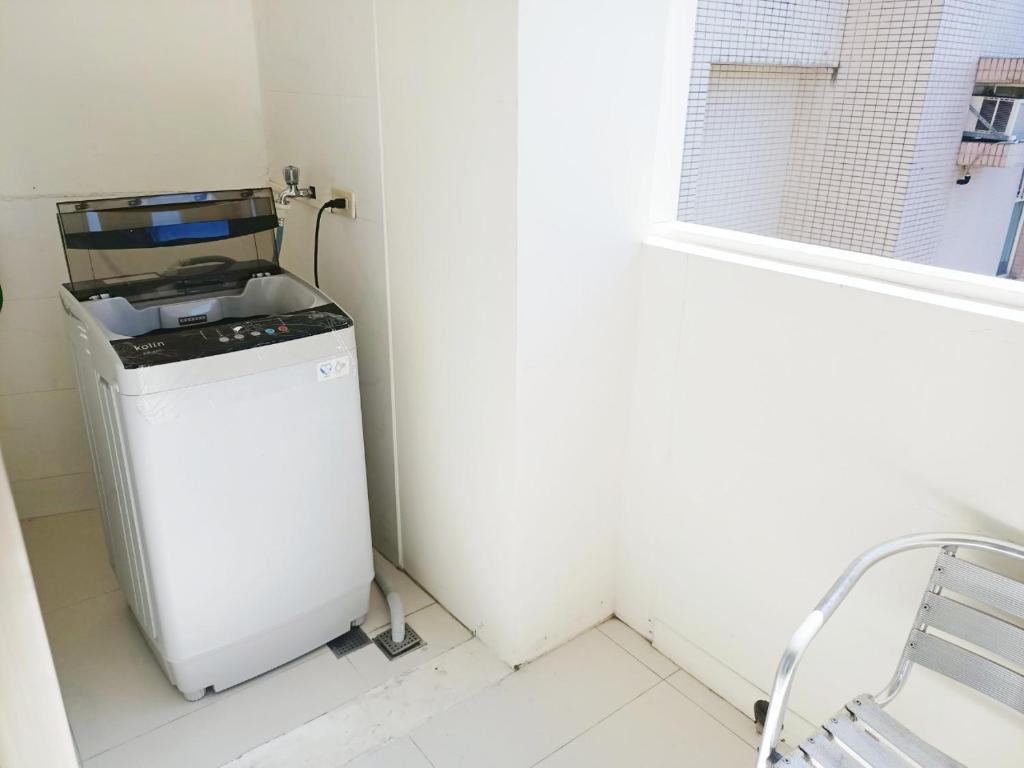 Kuchyň nebo kuchyňský kout v ubytování Tianmu Star Urban Living