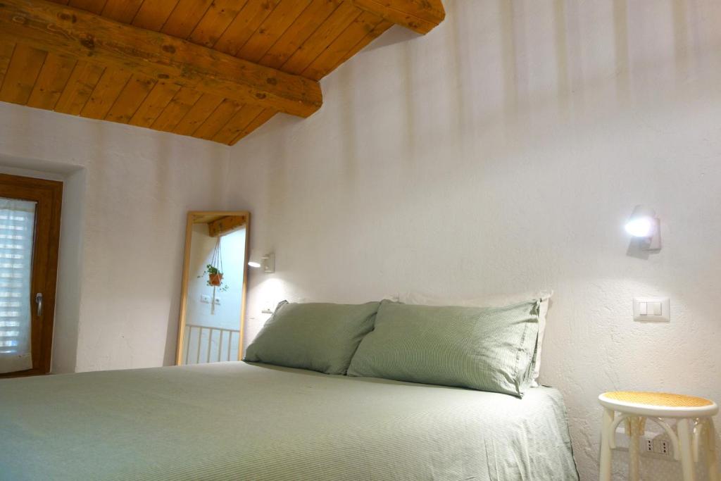 En eller flere senge i et værelse på La Smeraldina - Casa vacanze