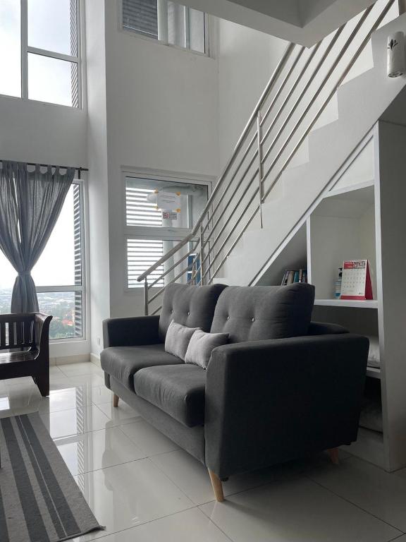 Posezení v ubytování Yenni Duplex @ DeCentrum, Kajang