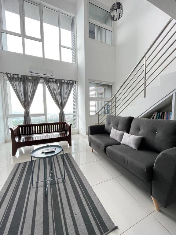 Posezení v ubytování Yenni Duplex @ DeCentrum, Kajang