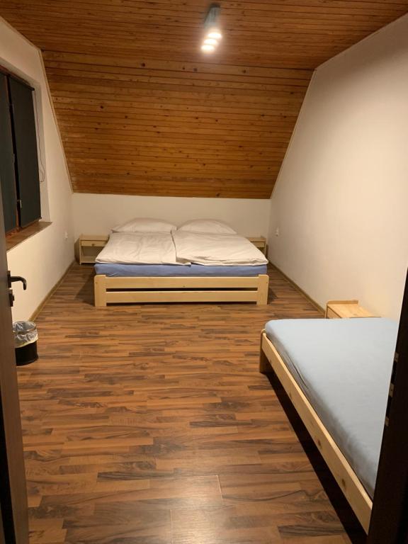 Postel nebo postele na pokoji v ubytování Bystravilla