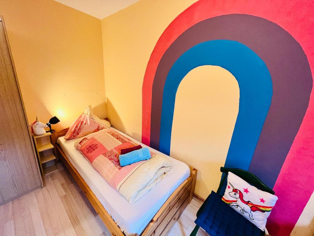 Postel nebo postele na pokoji v ubytování Vor lauter Bäumen B&B