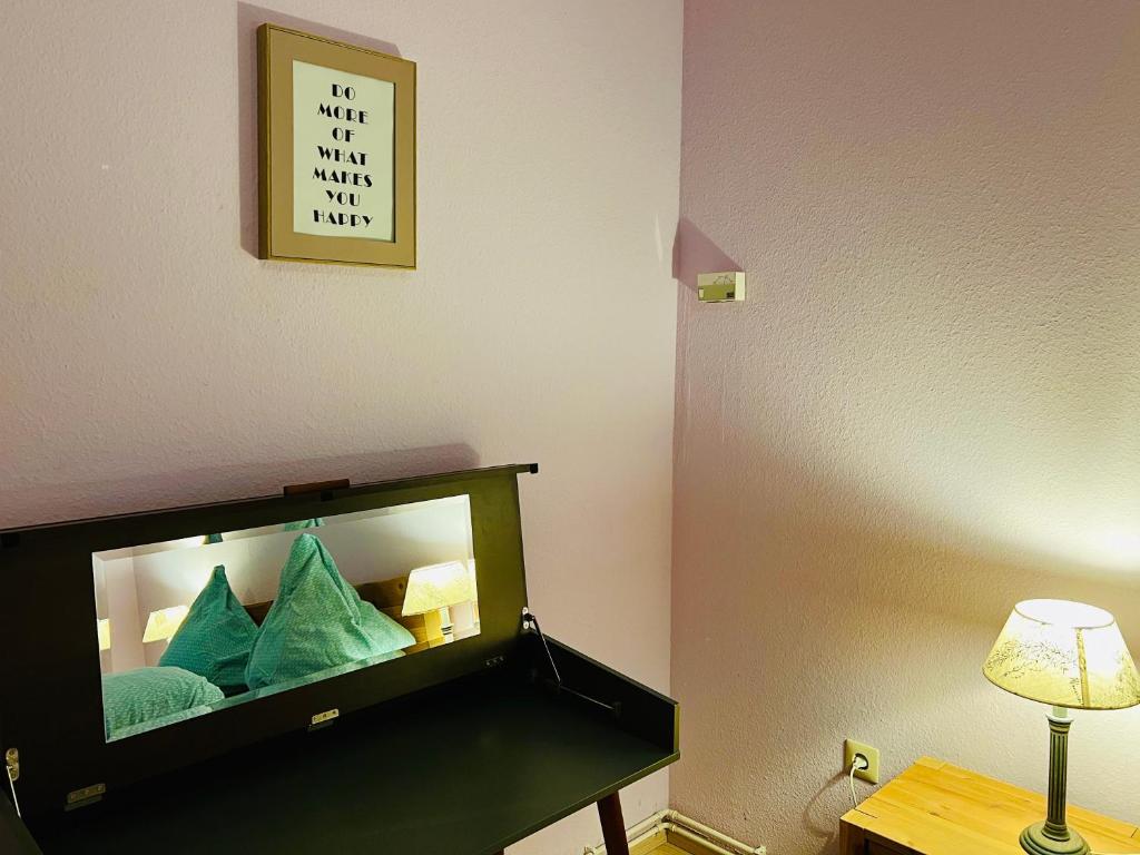 Postel nebo postele na pokoji v ubytování Vor lauter Bäumen B&B