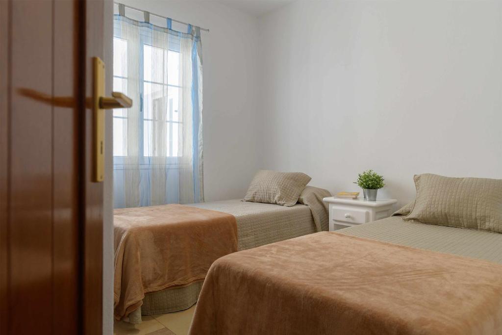 Postel nebo postele na pokoji v ubytování Casa marilia