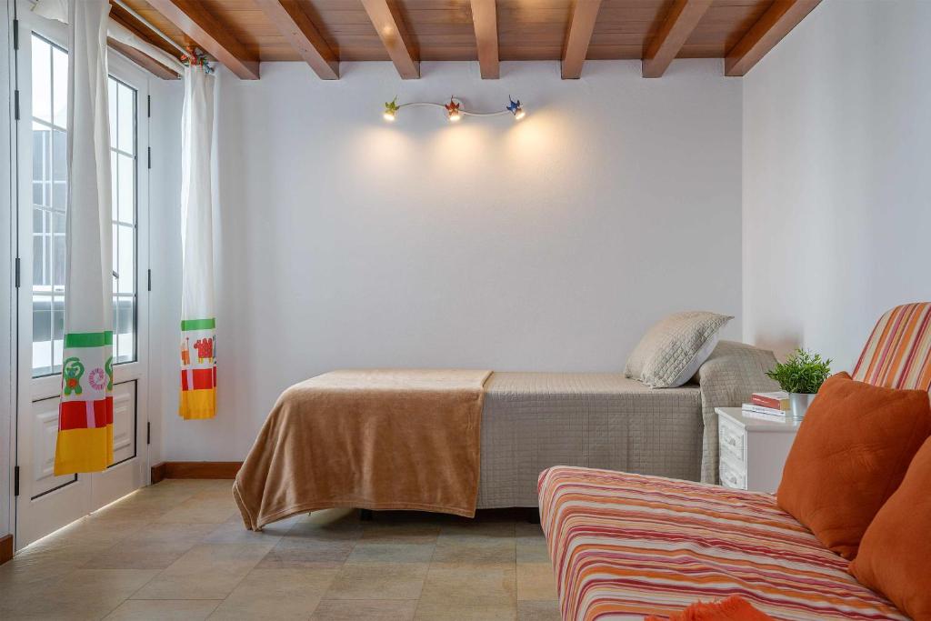 Postel nebo postele na pokoji v ubytování Casa marilia
