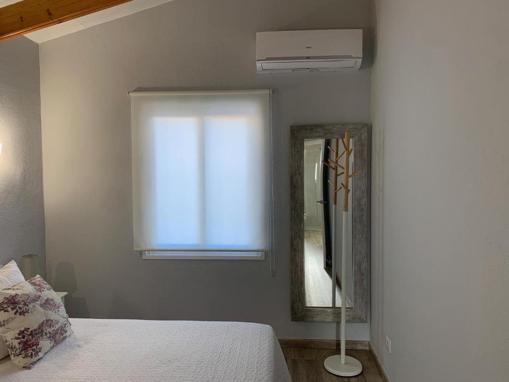 Postel nebo postele na pokoji v ubytování Villa Sol del Sur 10