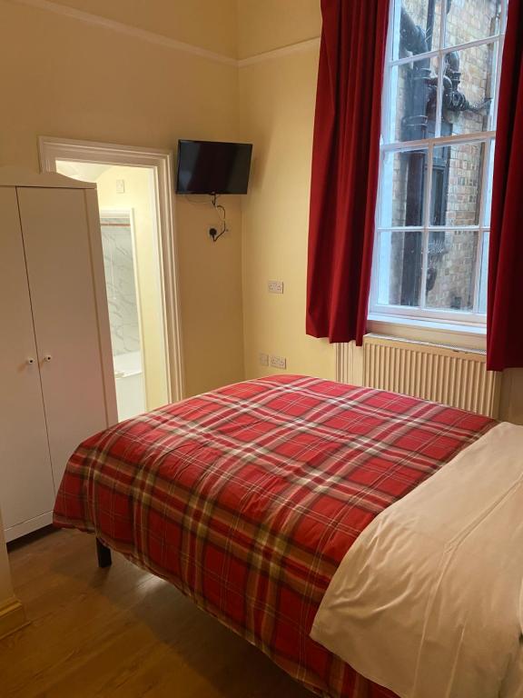 Postel nebo postele na pokoji v ubytování 27 Argyle Square