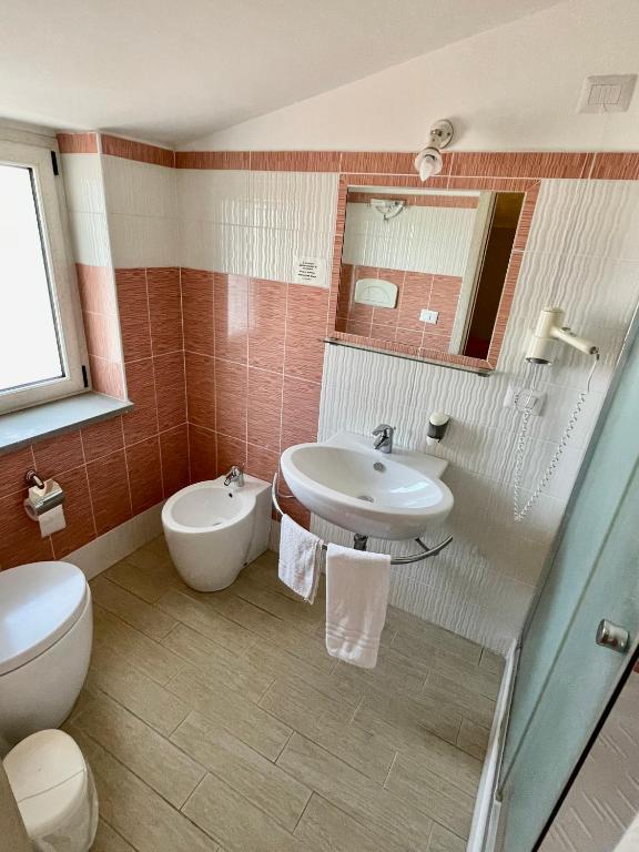 Koupelna v ubytování Hotel Al Rustico