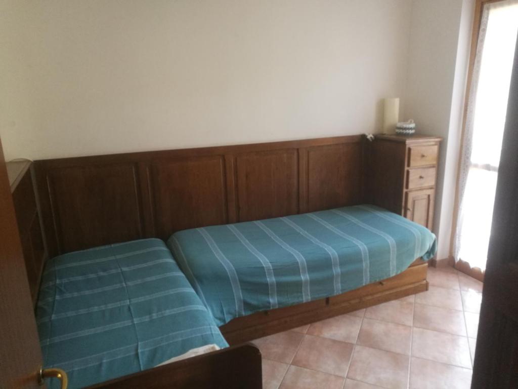 Postel nebo postele na pokoji v ubytování Casa Corone