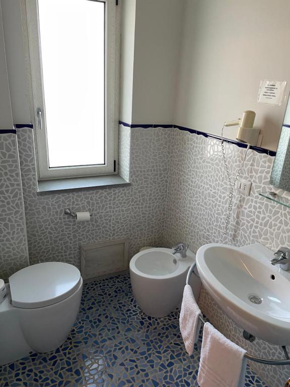 Koupelna v ubytování Hotel Al Rustico