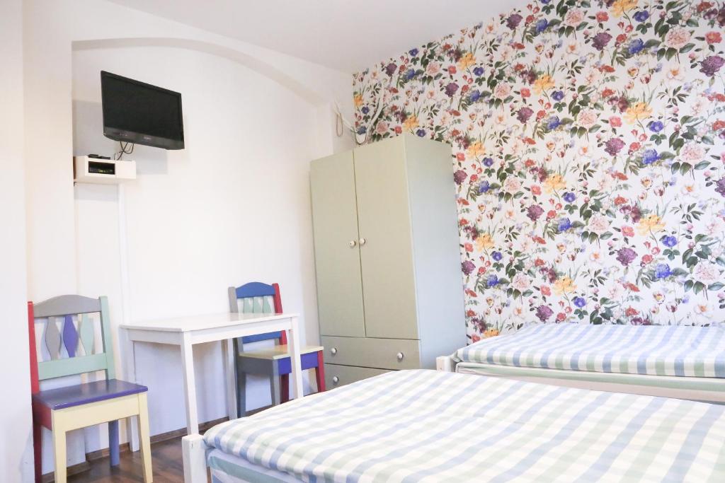 Postel nebo postele na pokoji v ubytování Dubina