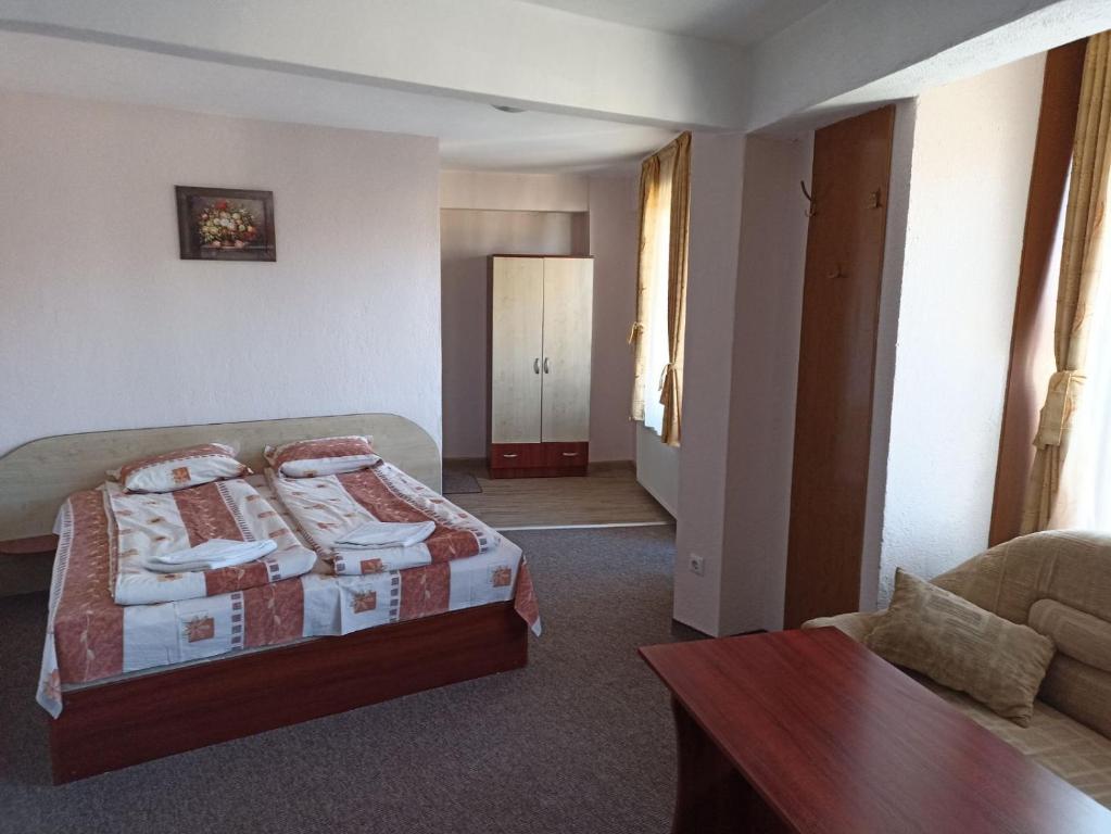 Postel nebo postele na pokoji v ubytování Petar Guest House