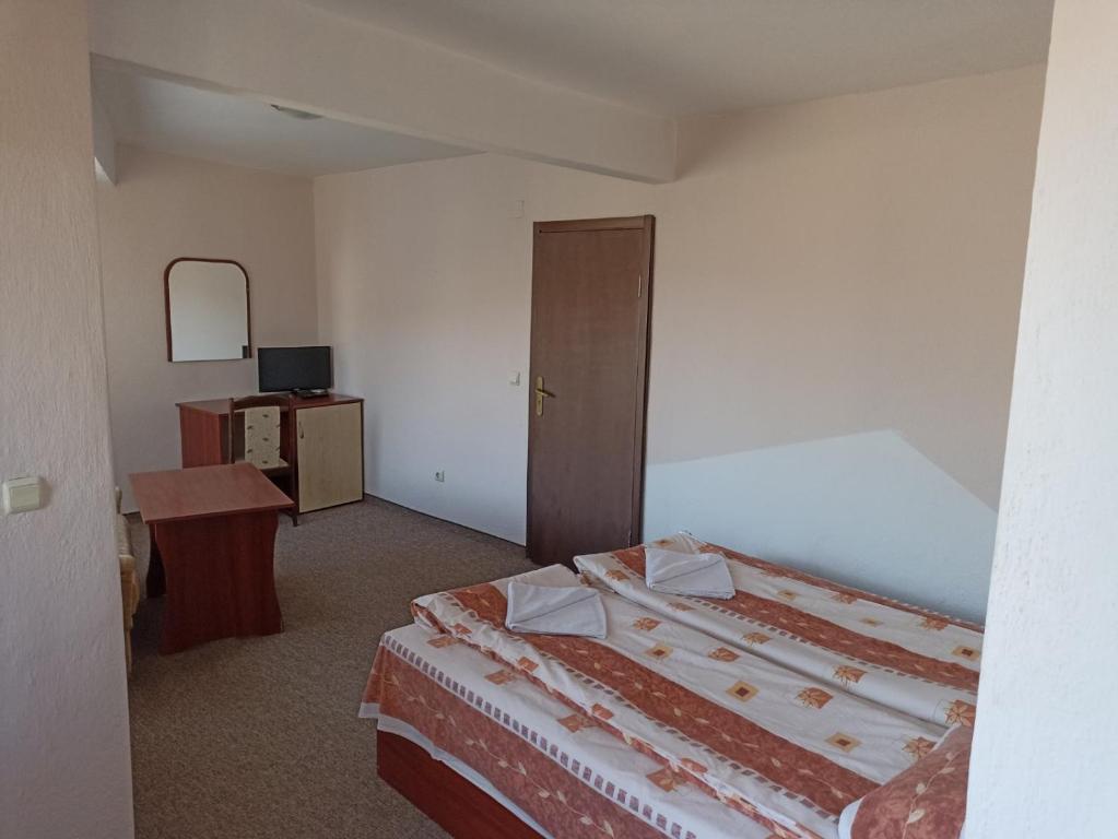 Postel nebo postele na pokoji v ubytování Petar Guest House