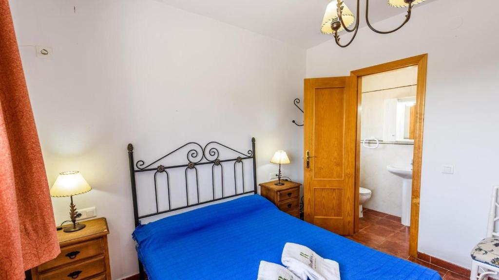 Posteľ alebo postele v izbe v ubytovaní Casa Los Pérez Sedella by Ruralidays