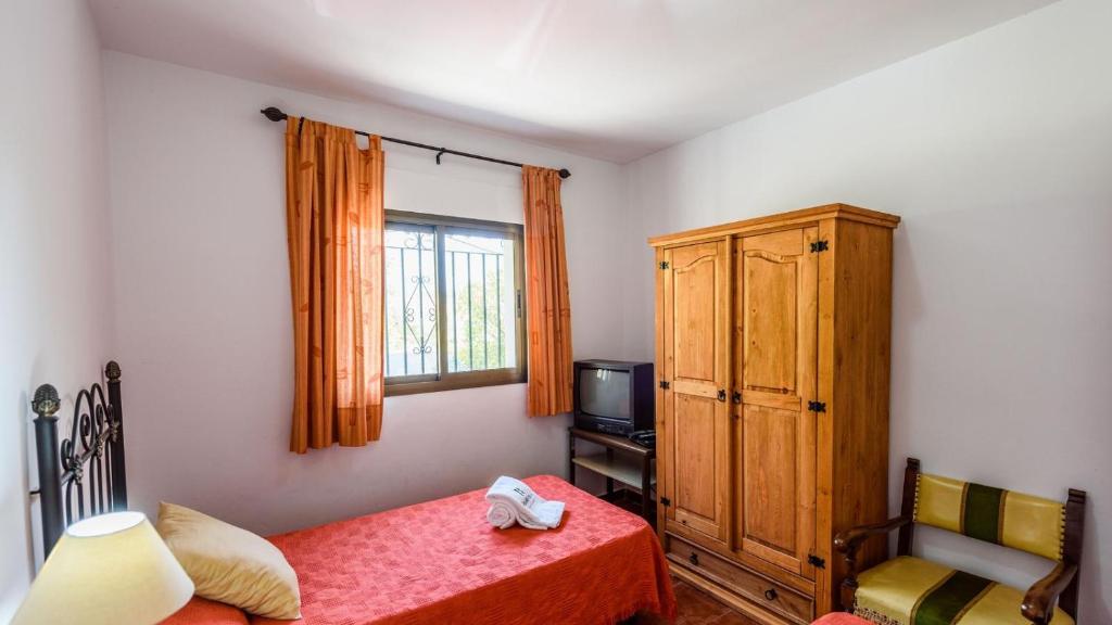 Posteľ alebo postele v izbe v ubytovaní Casa Los Pérez Sedella by Ruralidays