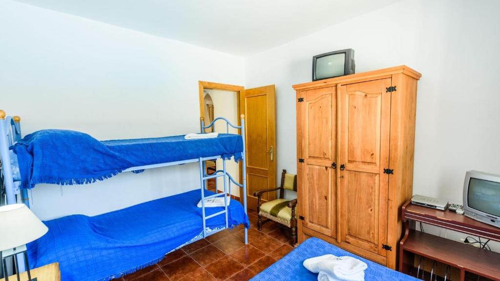 Posteľ alebo postele v izbe v ubytovaní Casa Los Pérez Sedella by Ruralidays