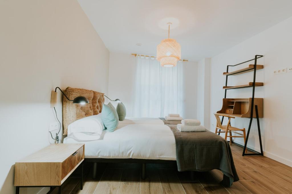 Postel nebo postele na pokoji v ubytování Natural Stay Apartamentos PassivHaus