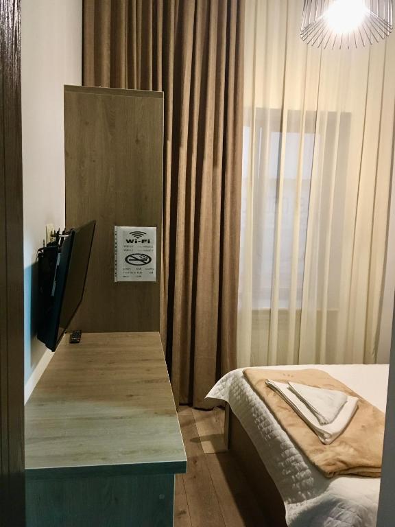 Postel nebo postele na pokoji v ubytování Iveria