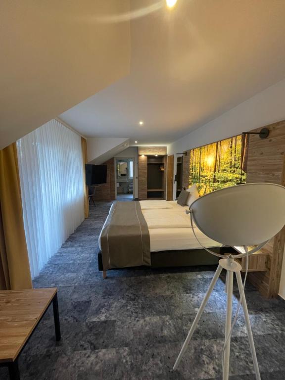 Postel nebo postele na pokoji v ubytování Hotel Christel