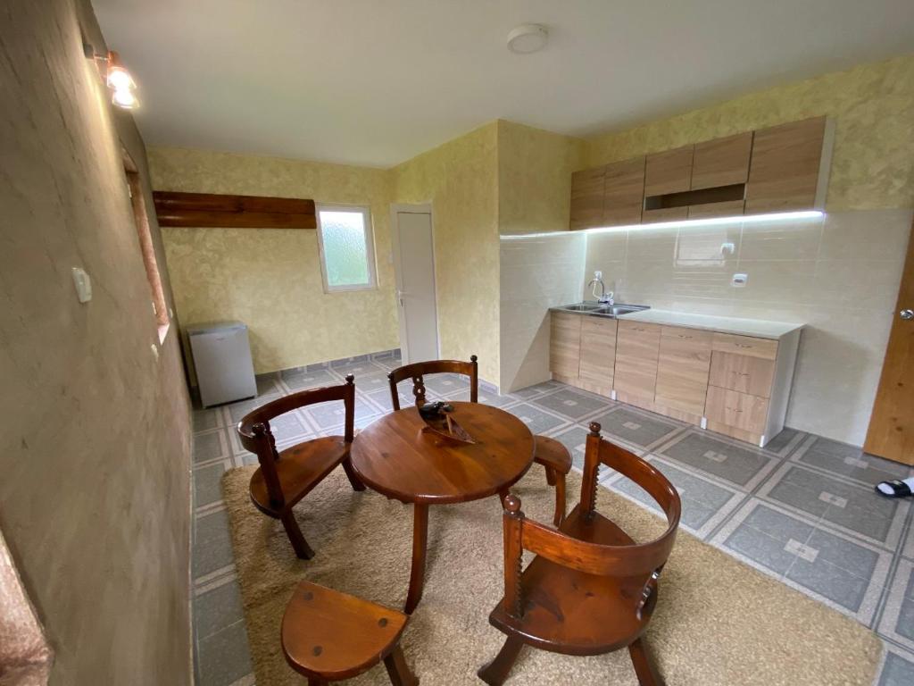 Kuchyň nebo kuchyňský kout v ubytování Apartman Sedmica