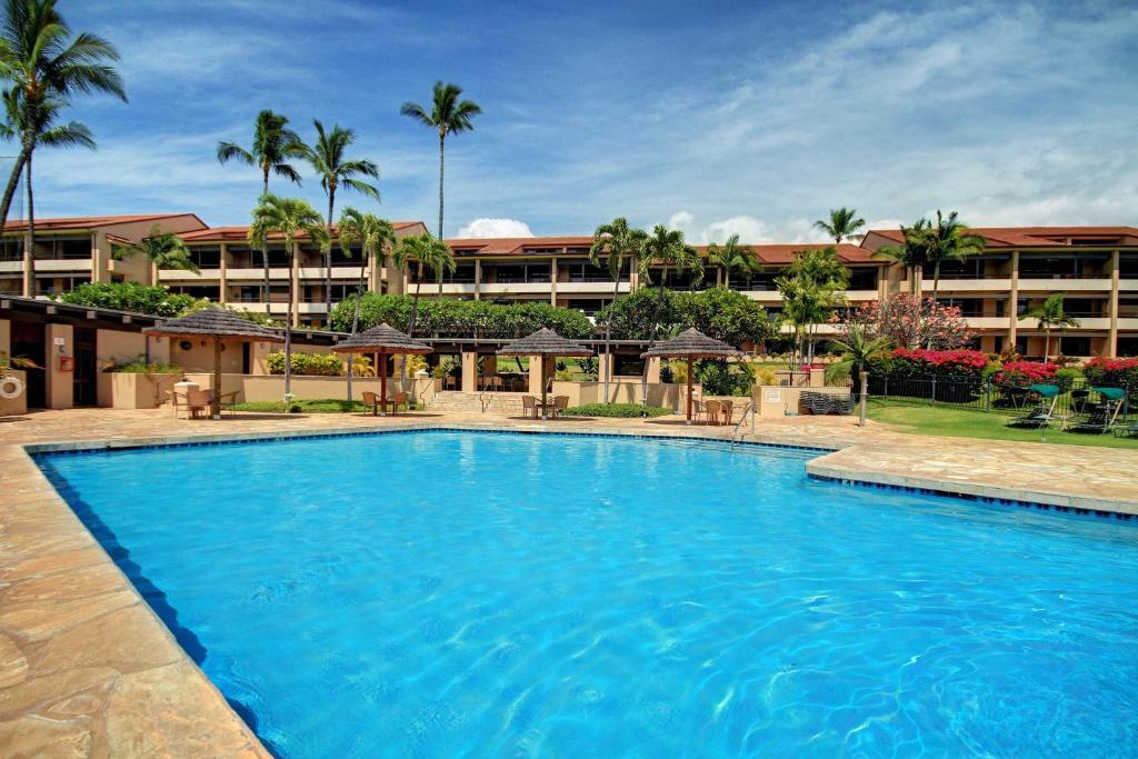 a large swimming pool in front of a hotel at Kaanapali Royal B201 in Lahaina