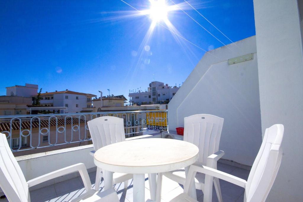 A balcony or terrace at Canovas Nerja - Casa adosada con piscina Los Huertos 7