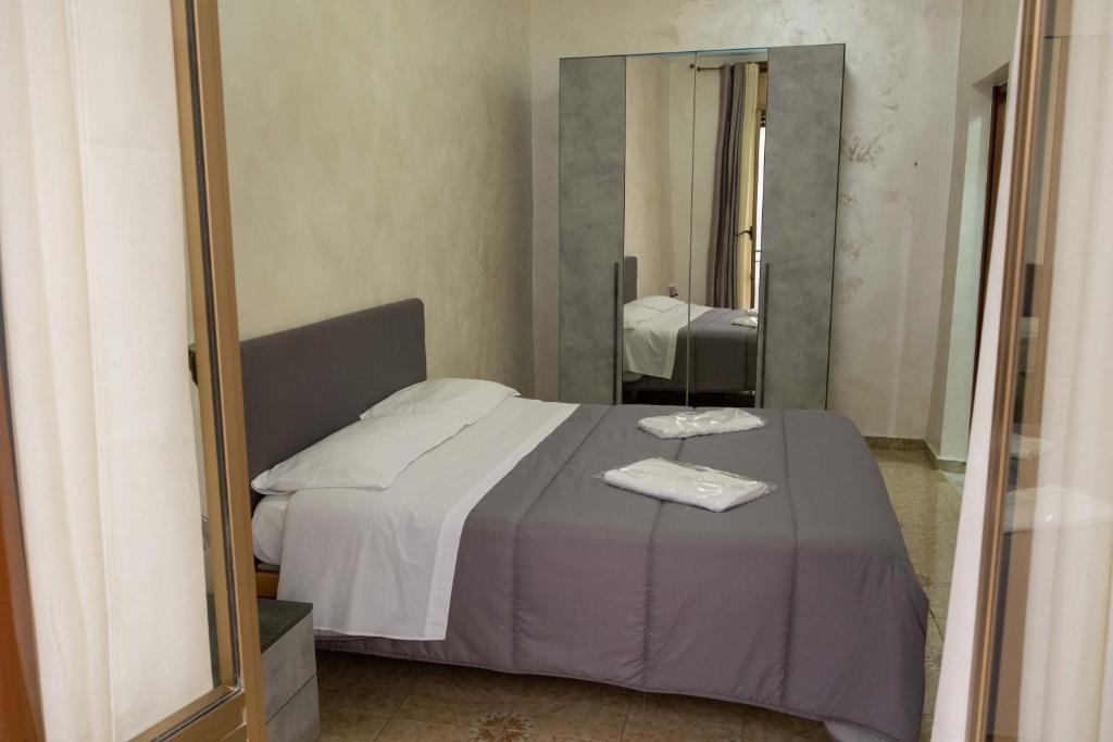 Giường trong phòng chung tại Casa vacanza russo enzo