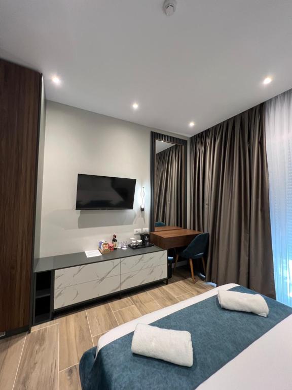 Domus Hotel & Apartments - Habitación Triple De Lujo