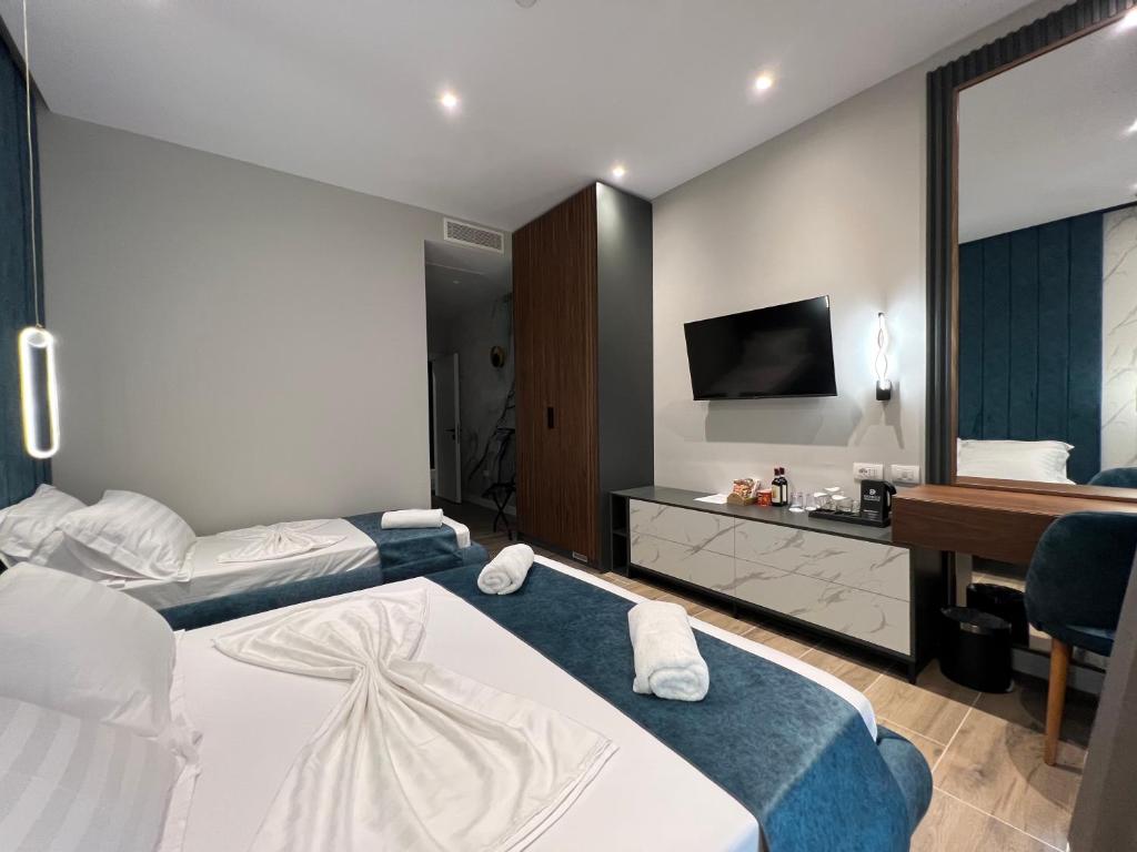 Domus Hotel & Apartments - Habitación Triple De Lujo