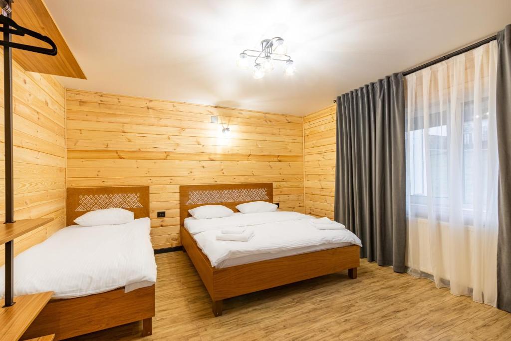 Postel nebo postele na pokoji v ubytování Comfort House
