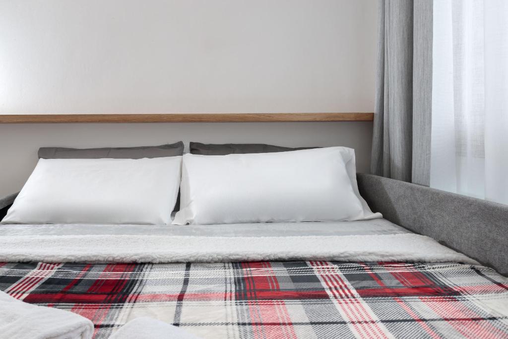 A bed or beds in a room at HelloChalet - The One - garage, bootdryer, home theatre with subwoofer, netflix, hydromassage Turkish bath